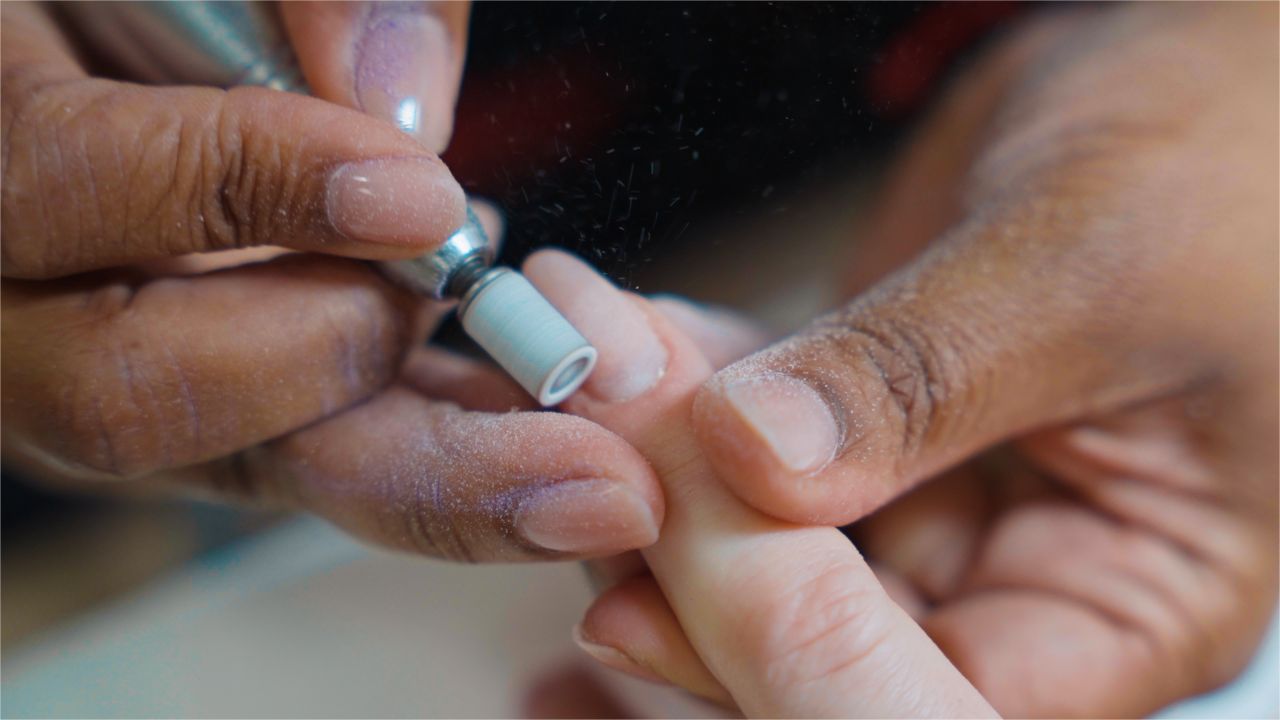 E-file nail prep close-up